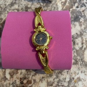 Geneva women’s gold color watch